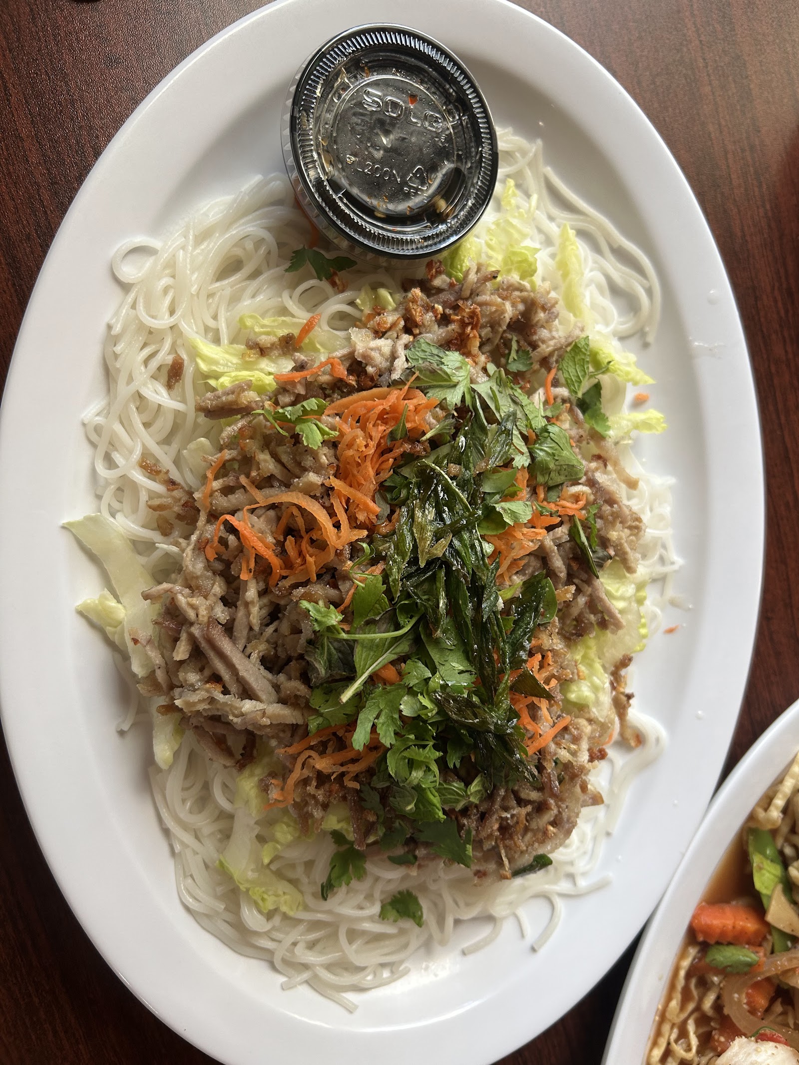 Beef vermicelli noodle salad with fresh herbs and carrots