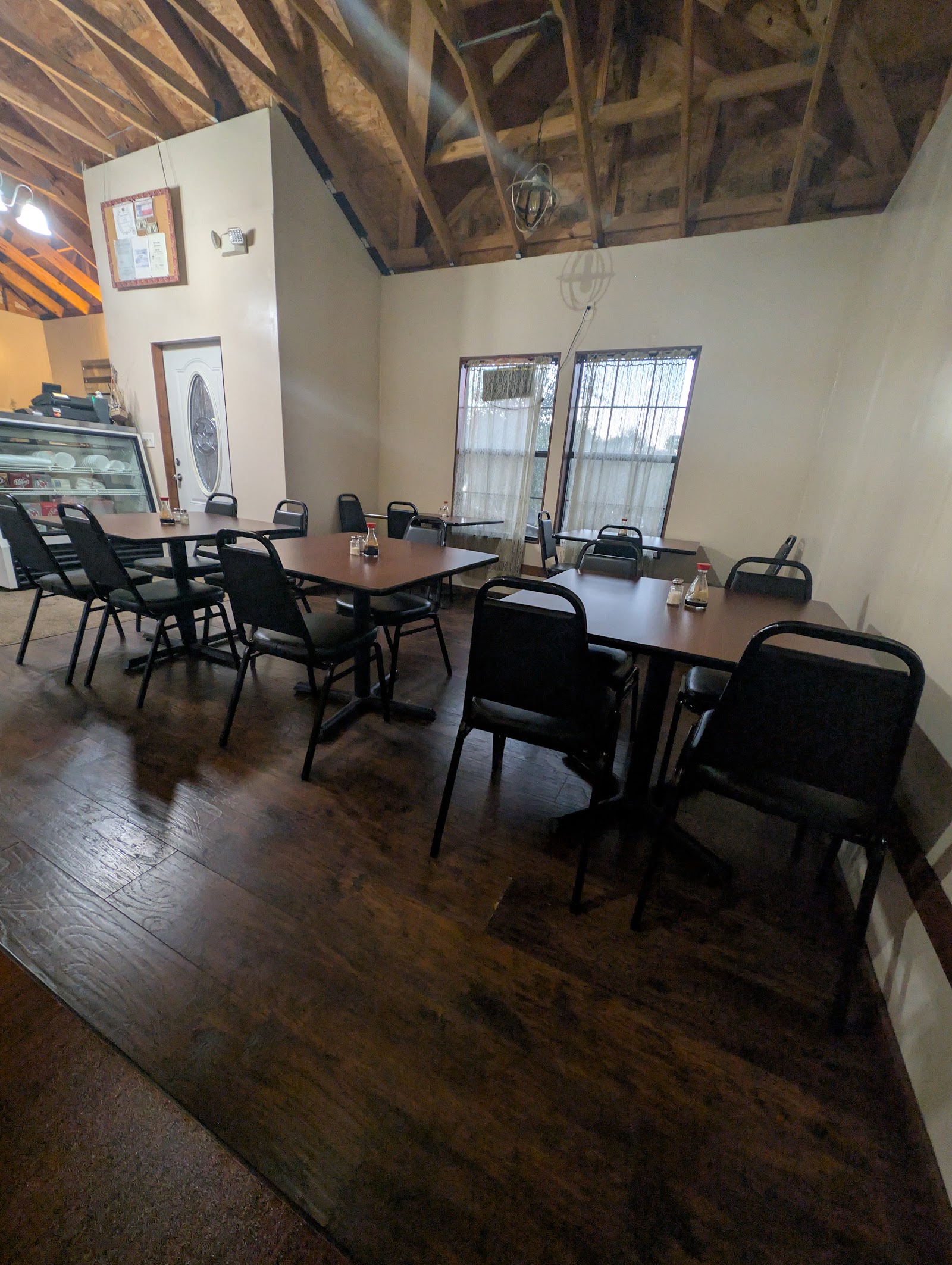 Rockin' Roadrunner dining room with vaulted wood ceiling